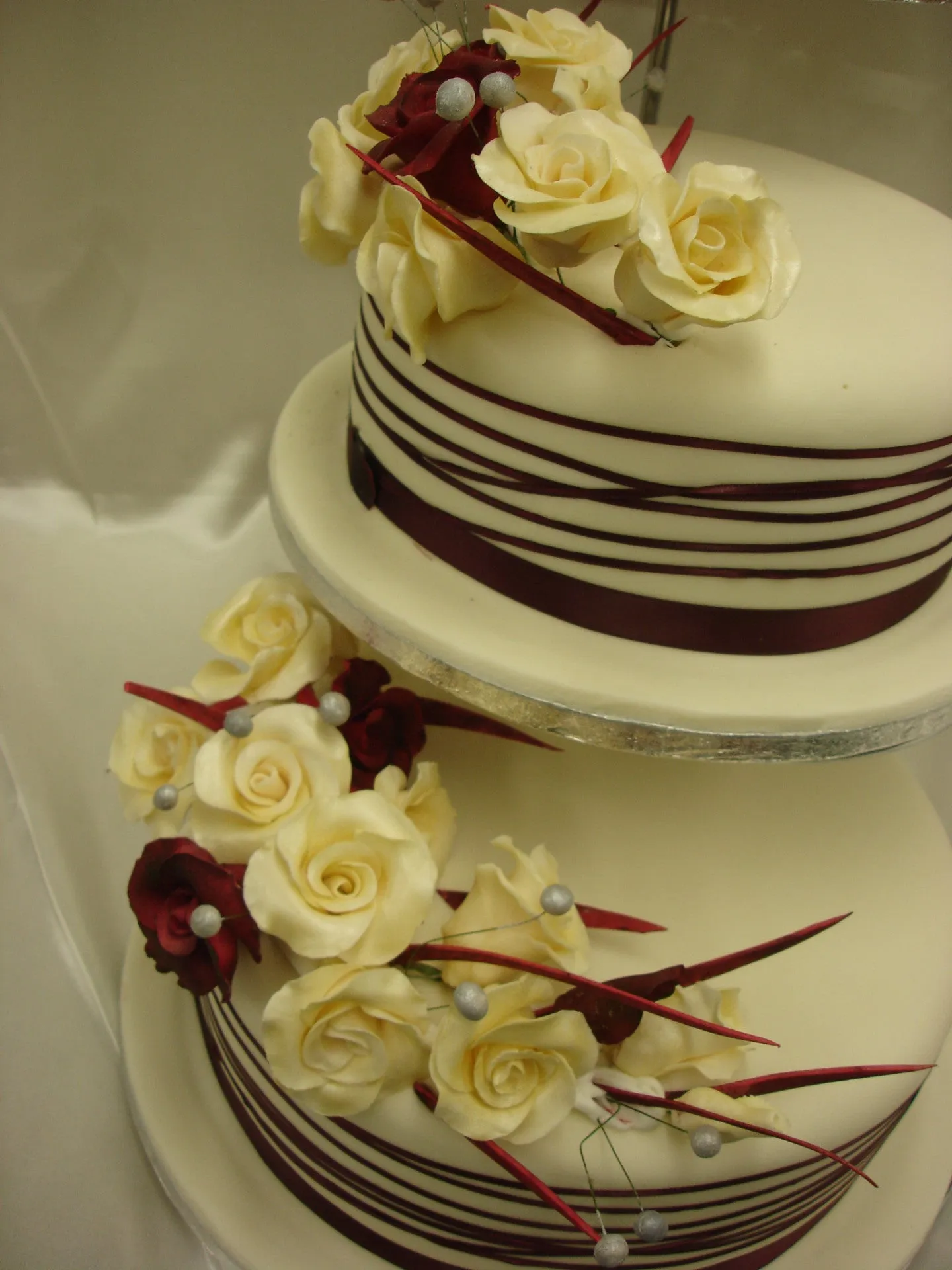 3 Tier  Ivory & Burgundy Rose Wedding Cake