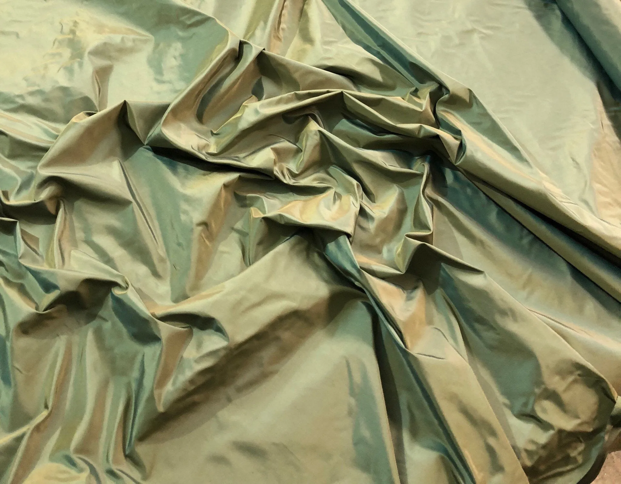 Silk taffeta 54&quot; wide    Beautiful iridescent green gold silk taffeta fabric sold by the yard